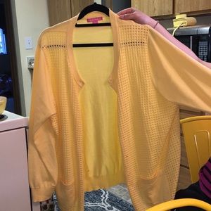 Yellow sweater with open knit details